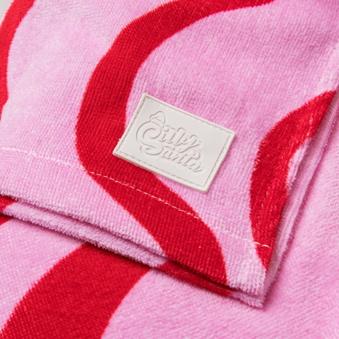 Pinke Wellen Badeponcho Kinder